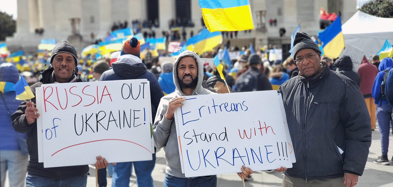 May be an image of 7 people, people standing and text that says 'RUSSIA OUT of UKRAINE! ritreans stand with UKRAINE!!'